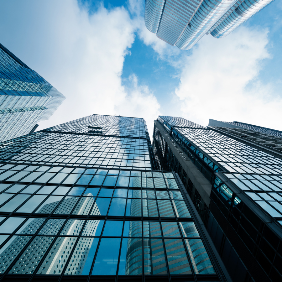 Modern skyscrapers with reflective glass surfaces.